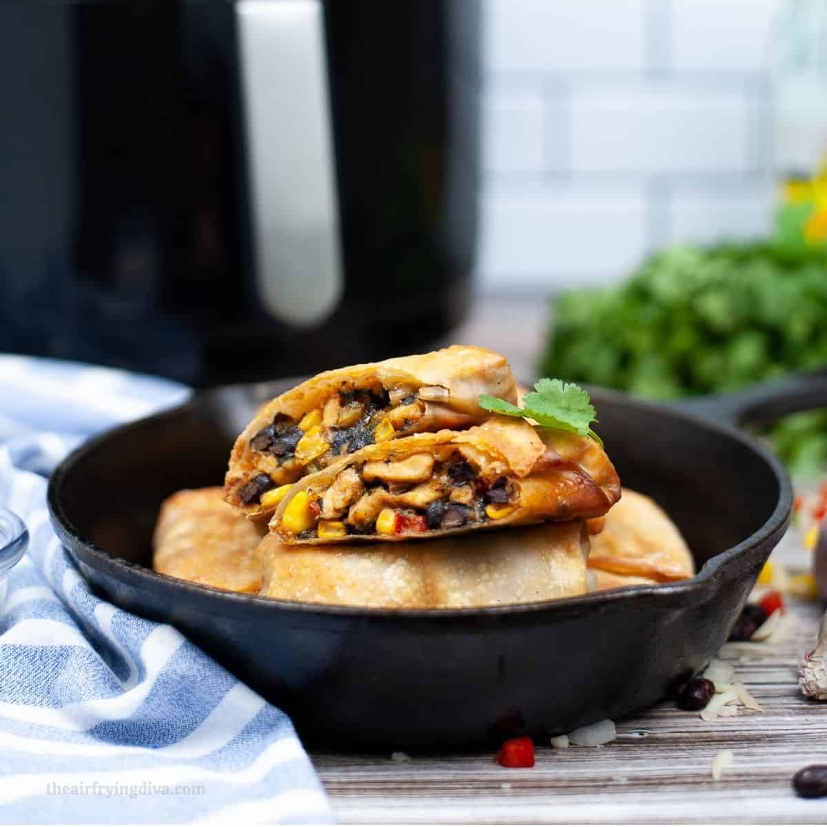 Air Fryer Southwestern Egg Rolls, a simple and delicious appetizer or meal recipe made with seasoned chicken, black beans, and corn.