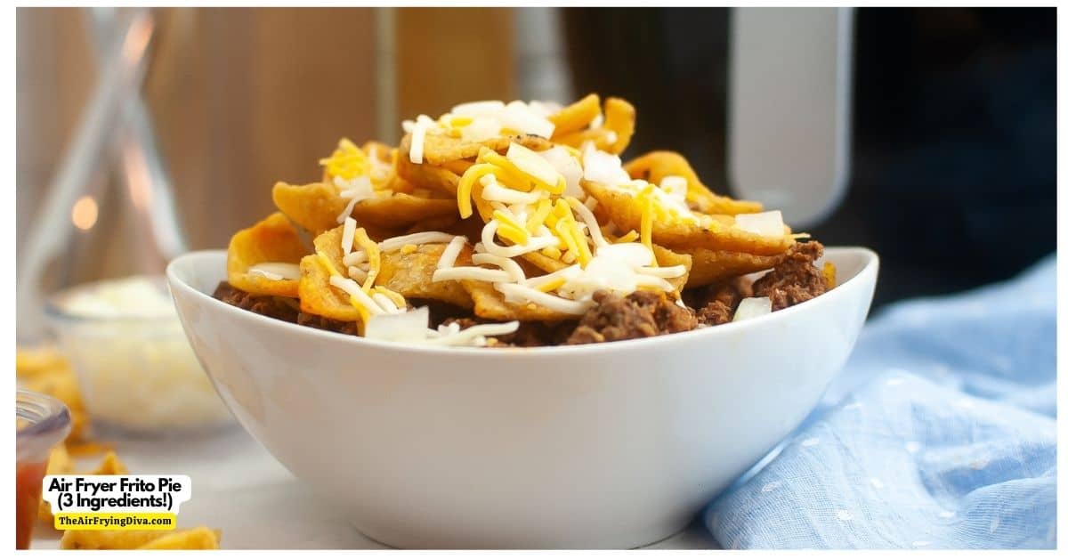 Air Fryer Frito Pie ( just 3 ingredients!), a simple and delicious meal or appetizer recipe made with corn chips, chili, and cheese. 