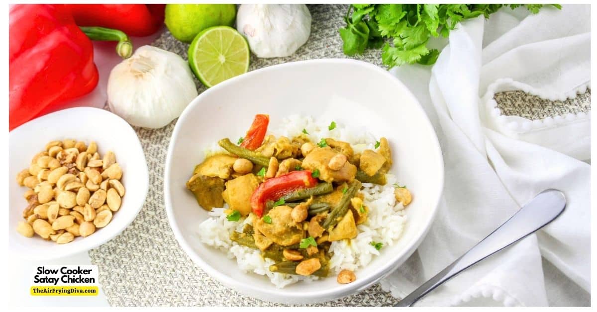 Slow Cooker Crock Pot Satay Chicken is an easy meal recipe idea moist and flavorful chicken slowly cooked in a spicy peanut butter sauce.