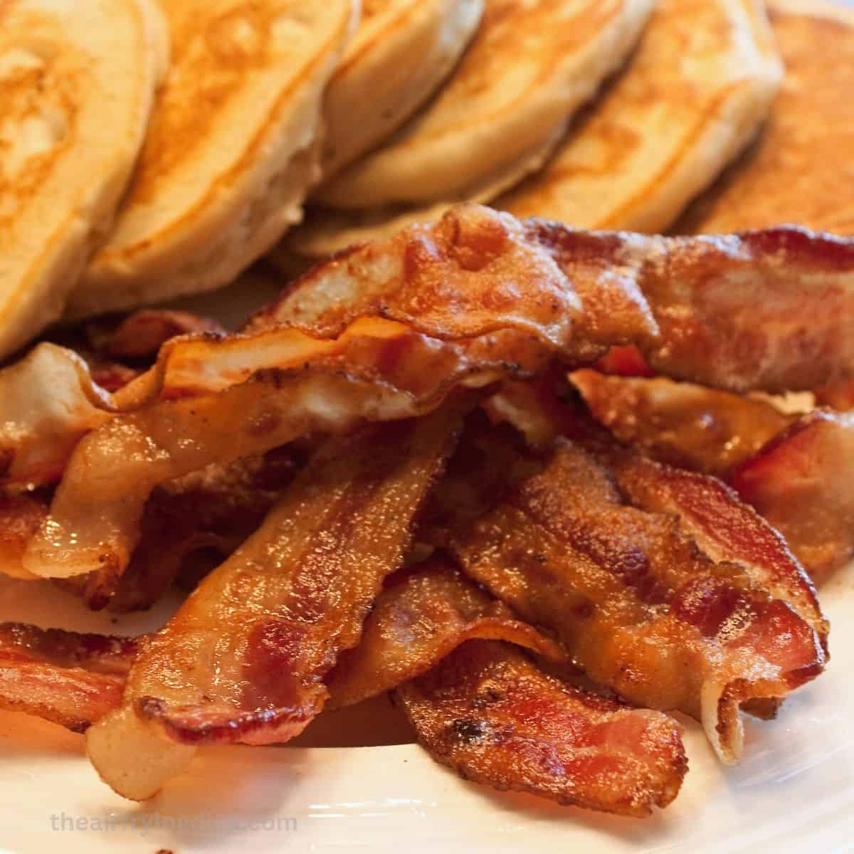 Air Fryer Bacon, an easy recipe for cooking air fried bacon for breakfast, brunch, or any time, in about 10 minutes.