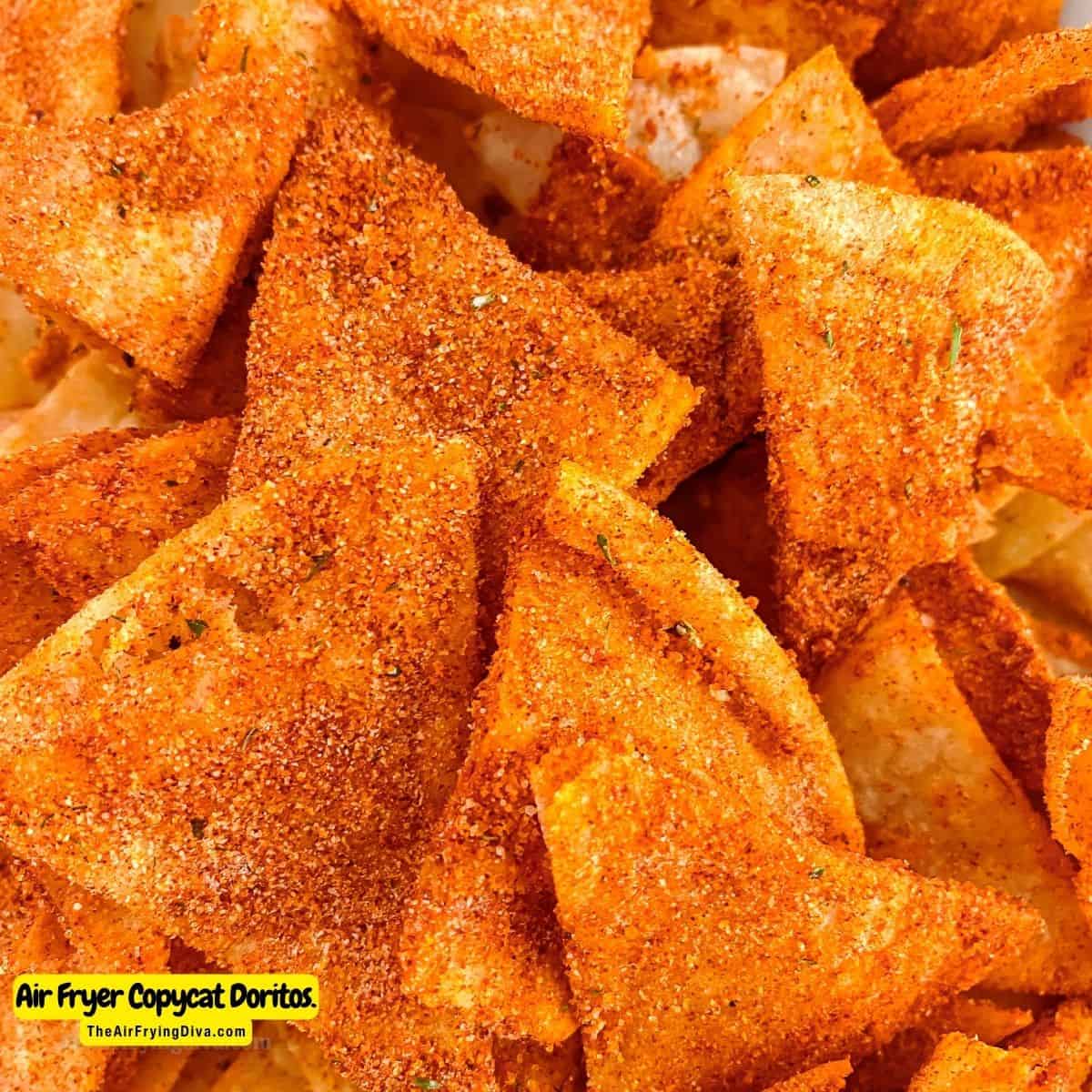 Air Fryer Copycat Doritos, a simple and delicious snack recipe made with tortillas and seasoned with nacho seasoning.