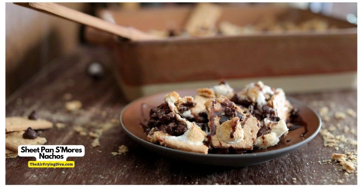 Sheet Pan S’Mores Nachos, a delicious snack or dessert recipe made with marshmallows, chocolate, and graham crackers, baked in an oven.