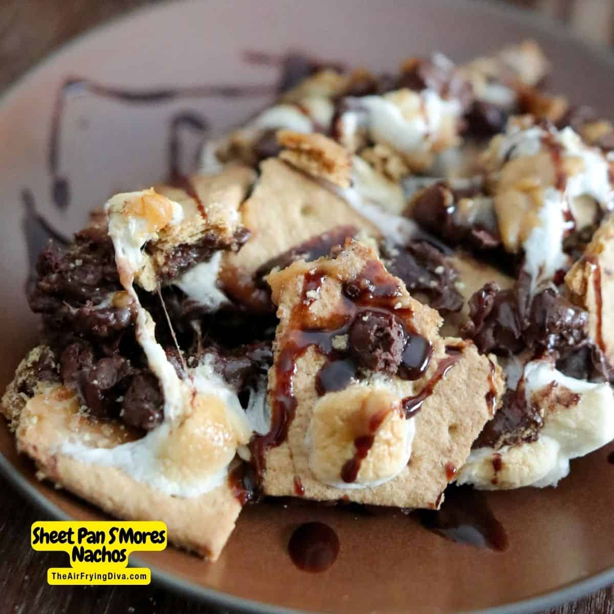 Sheet Pan S’Mores Nachos, a delicious snack or dessert recipe made with marshmallows, chocolate, and graham crackers, baked in an oven.