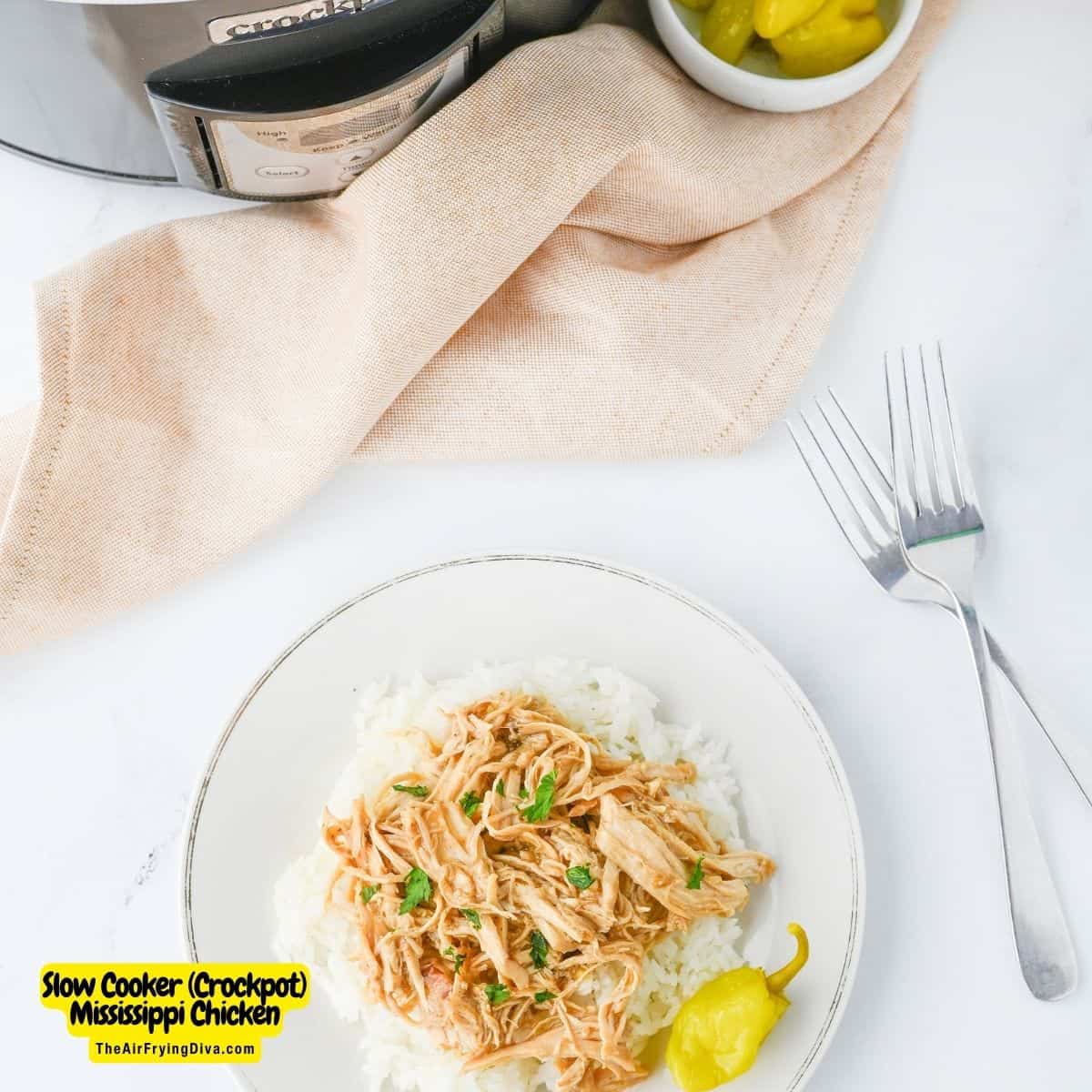 Slow Cooker (Crockpot) Mississippi Chicken, a delicious and easy dinner recipe made with  pepperoncini peppers and ranch seasoning.