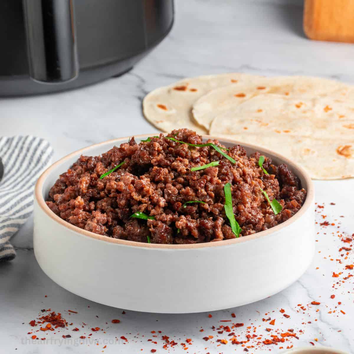 Air Fryer Taco Meat Recipe, a delicious savory and spicy air fried ground beef recipe made in less than 15 minutes