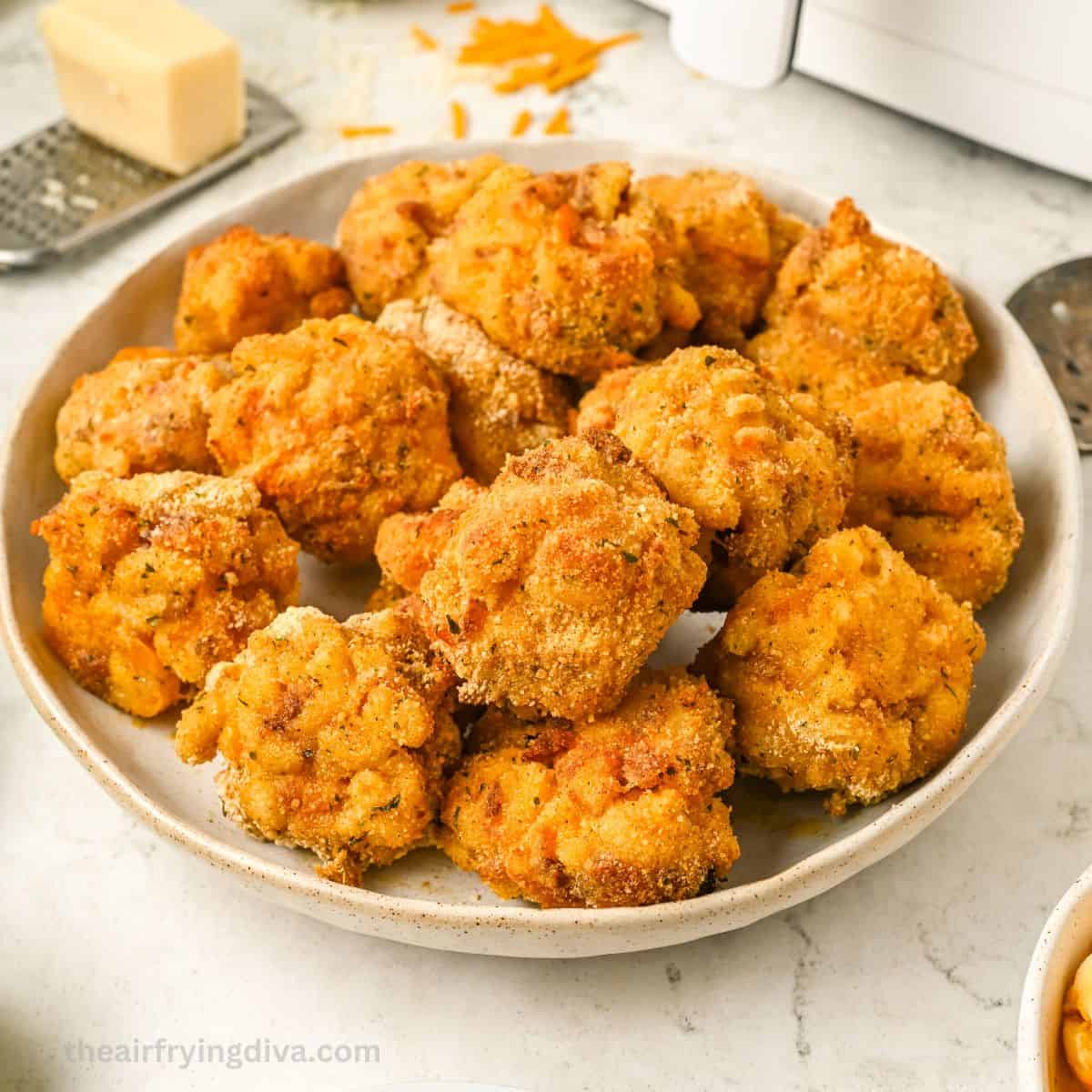 Air Fryer Mac and Cheese Bites, an easy appetizer or snack recipe made with breaded macaroni and cheese air fried until crisp.