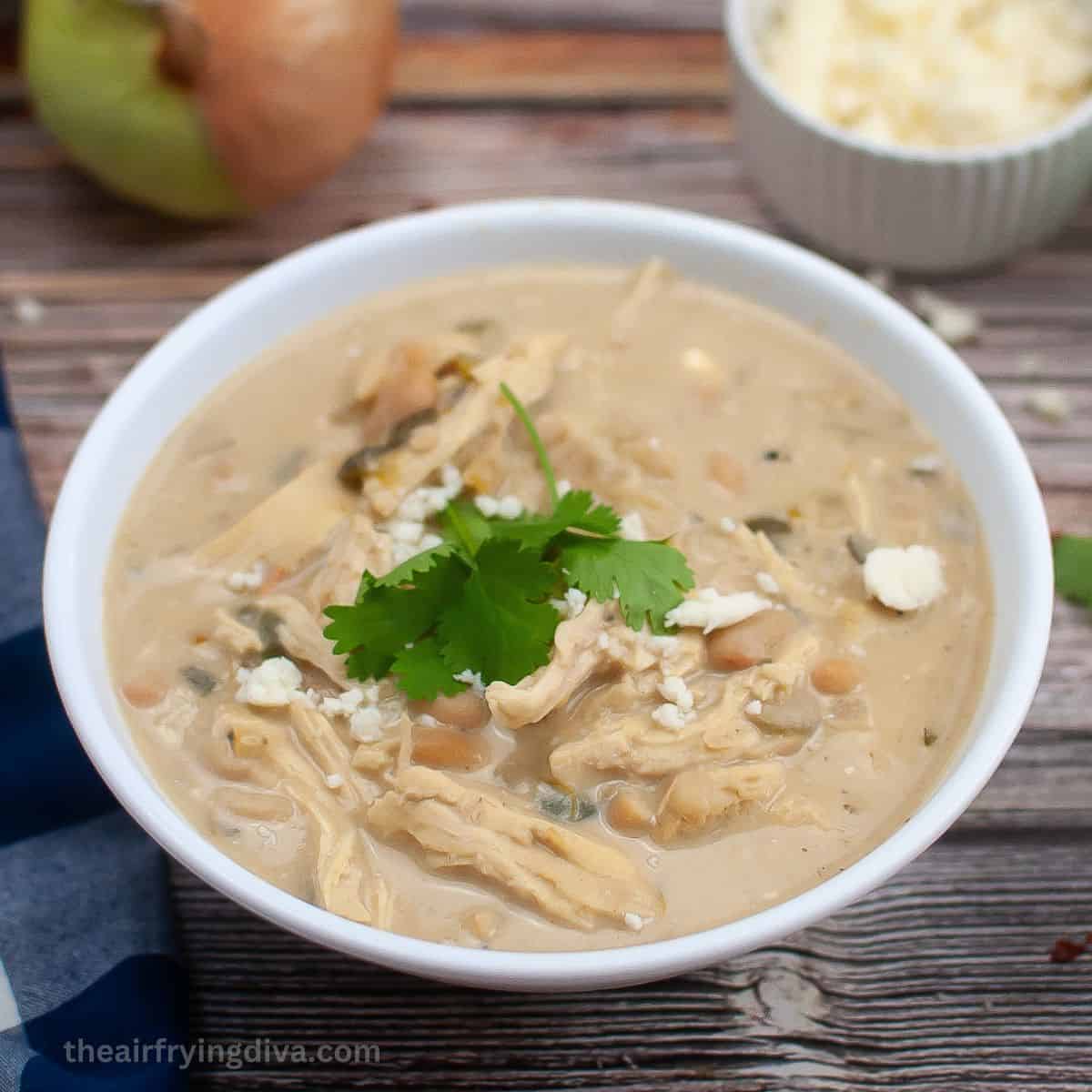 Crockpot Chili with Chicken Recipe, an easy slow cooker recipe for hearty and comforting chili made with white beans and chicken breast.