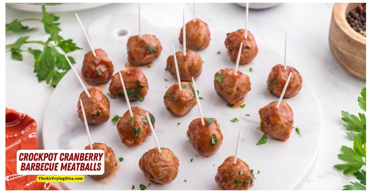  Crockpot Cranberry Barbecue Meatballs, a simple appetizer or party recipe made with cranberry sauce and slow cooked to perfection. 