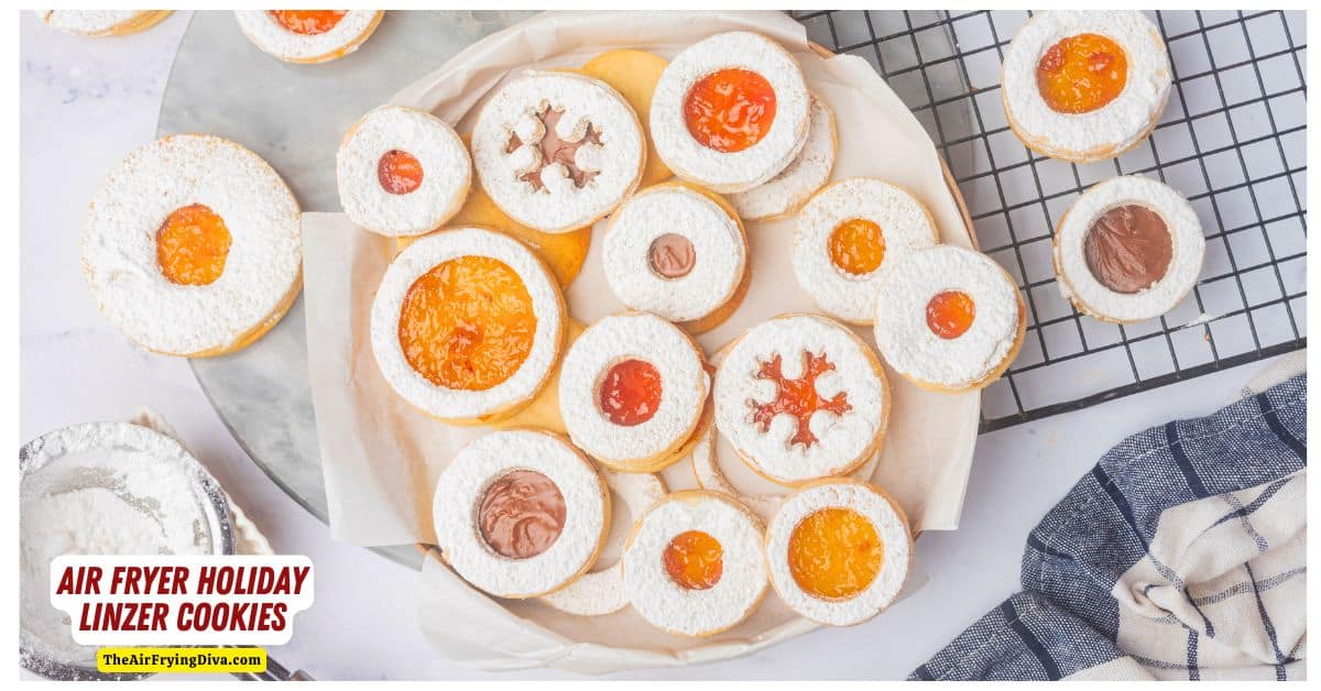 Air Fryer Holiday Linzer Cookies, a delicious Christmas cookie sandwich made with air fried almond cookies  with a jam center.