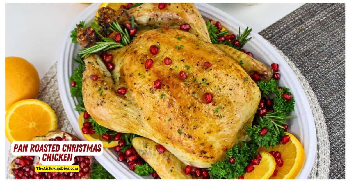 Pan Roasted Christmas Chicken Recipe, a moist and tender oven baked whole chicken flavored with orange slices and rosemary.