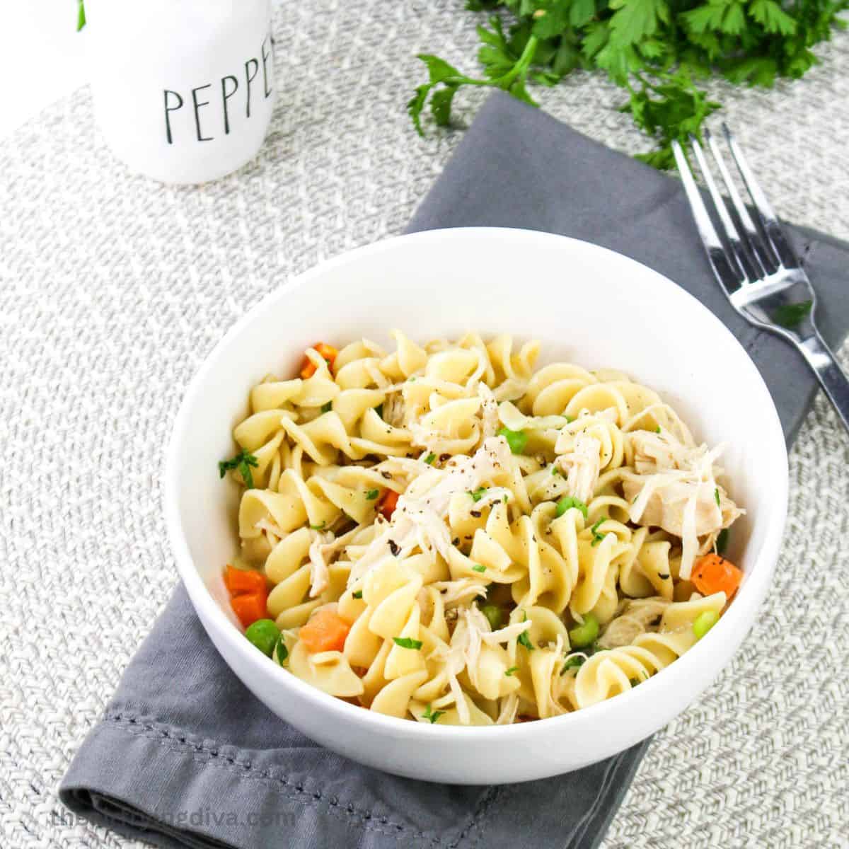 Instant Pot Chicken and Noodle Dinner, an easy and delicious meal made in a creamy and  flavorful sauce in about 30 minutes.  Pressure cooker recipe.