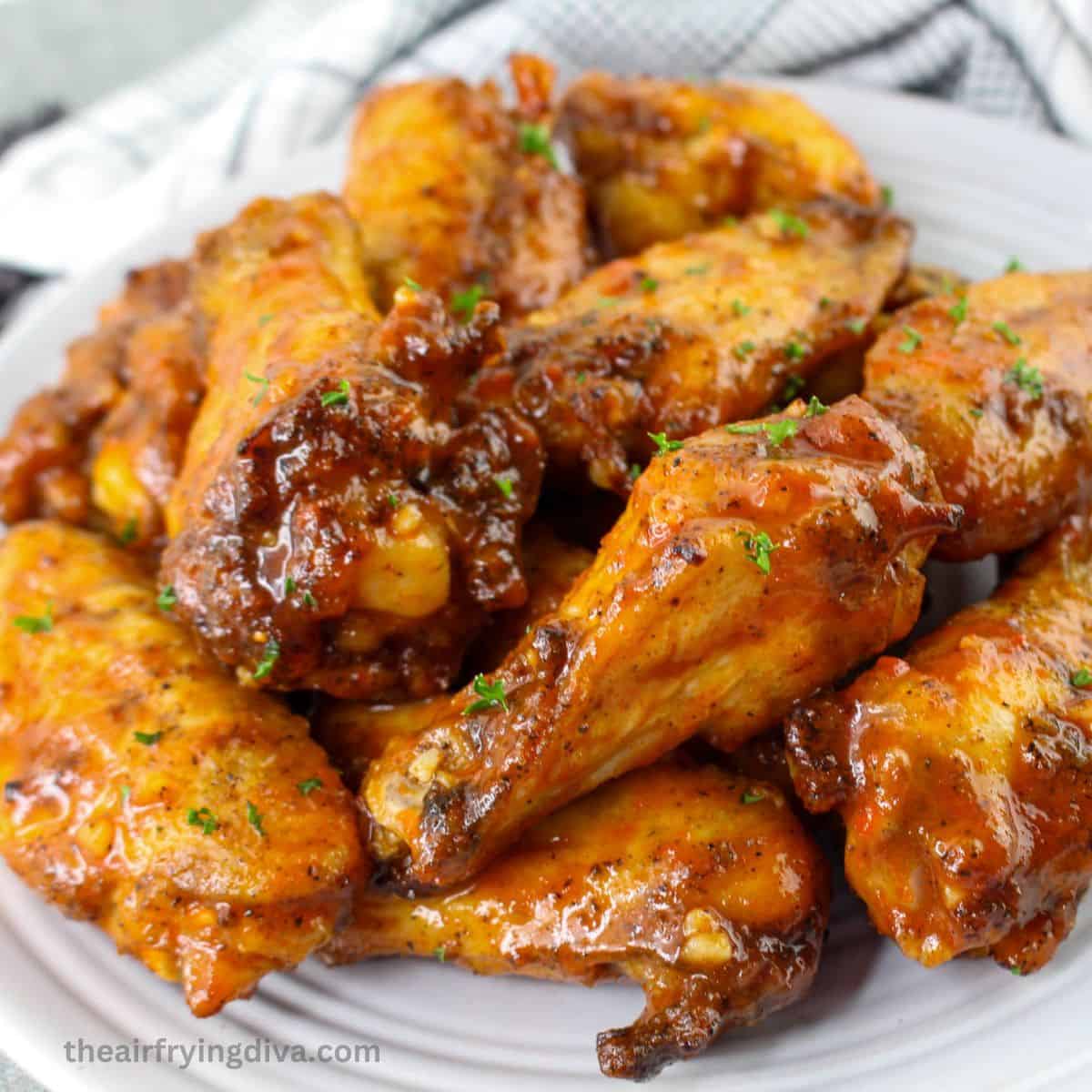 Sheet Pan Hot Honey Chicken Wings, an easy chicken recipe featuring savory, spicy, and sweet flavors, oven baked to mouthwatering perfection.