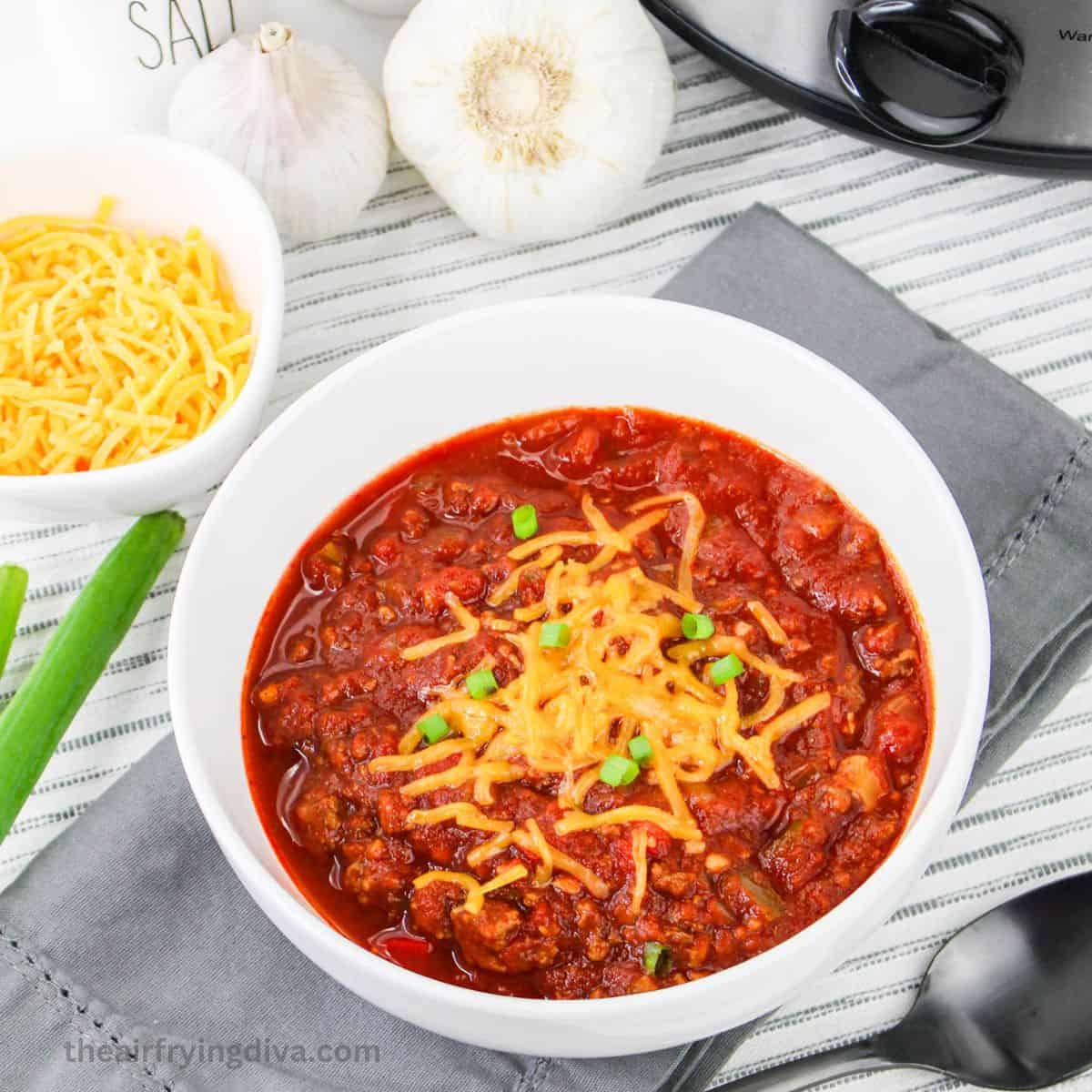 Crockpot No Bean Chili Recipe, a simple and hearty meal made with ground beef and savory seasonings, slow cooked to perfection.