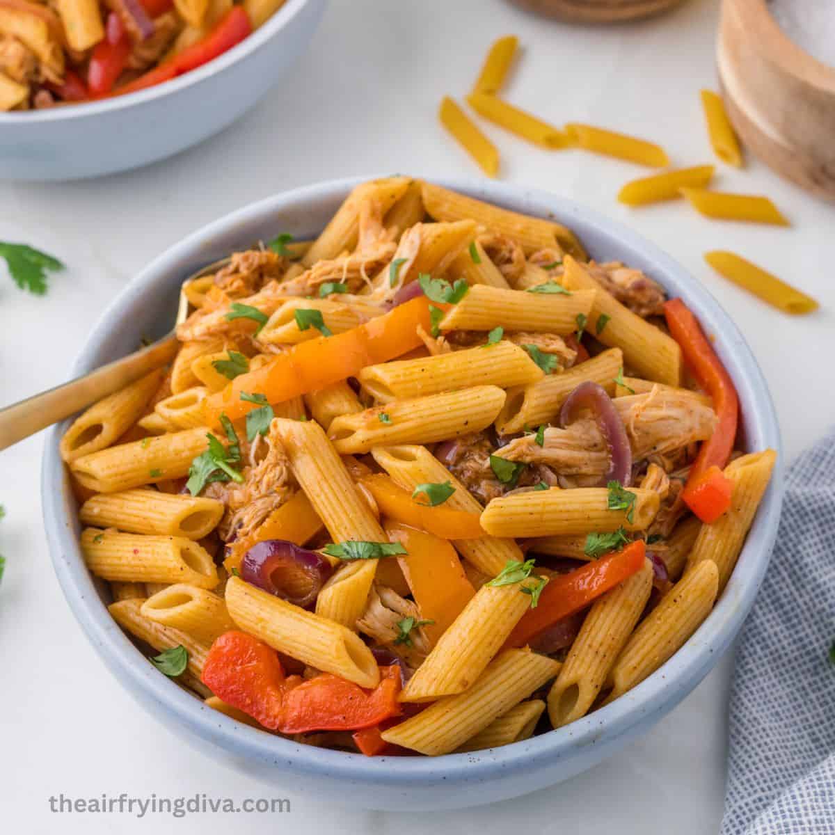 Skillet Chicken Fajita Pasta, a simple and flavorful dish made in one pan in less than a half hour using leftover or rotisserie chicken.