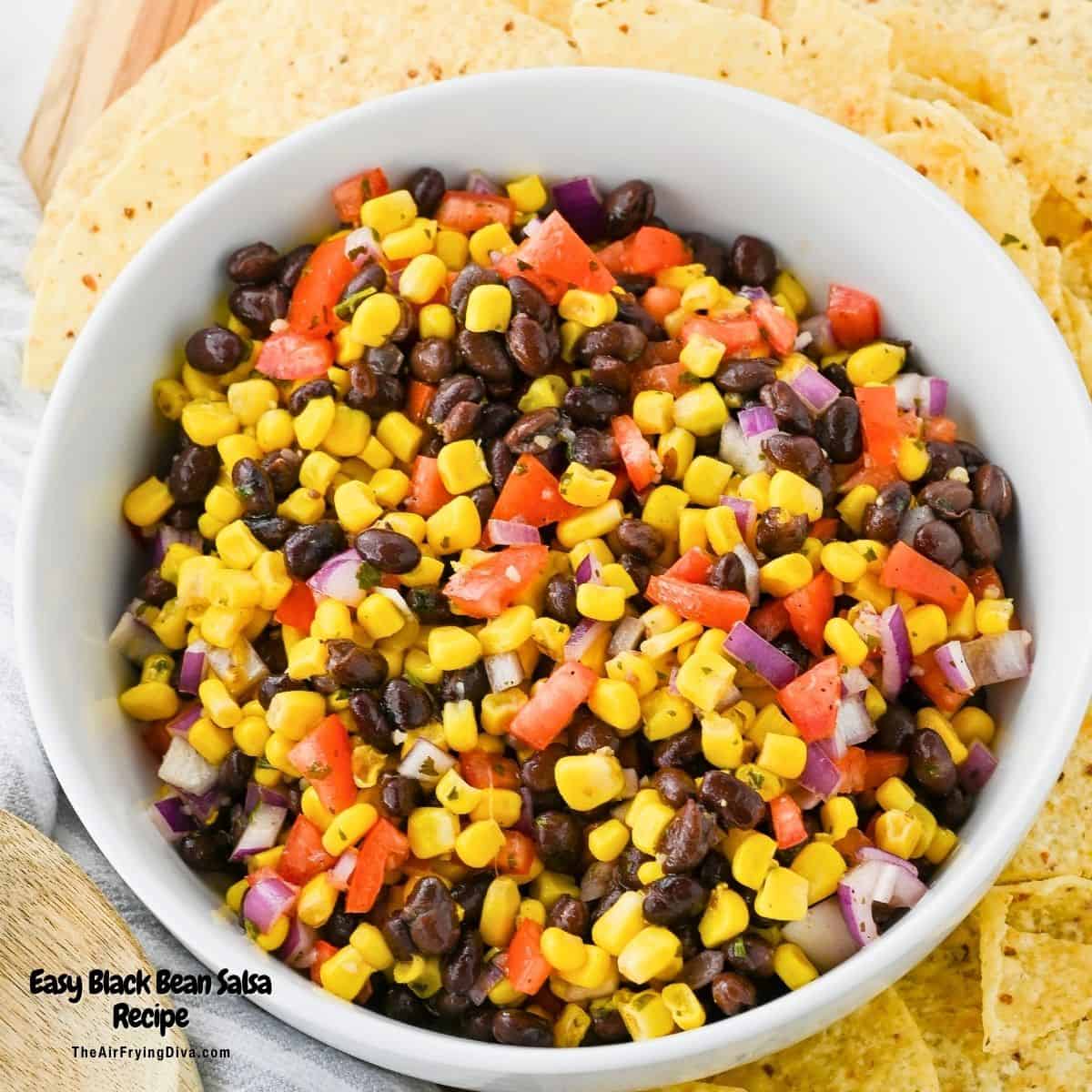 Easy Black Bean Salsa Recipe, a simple side dish recipe or appetizer dip made with corn and tomatoes in about 10 minutes.