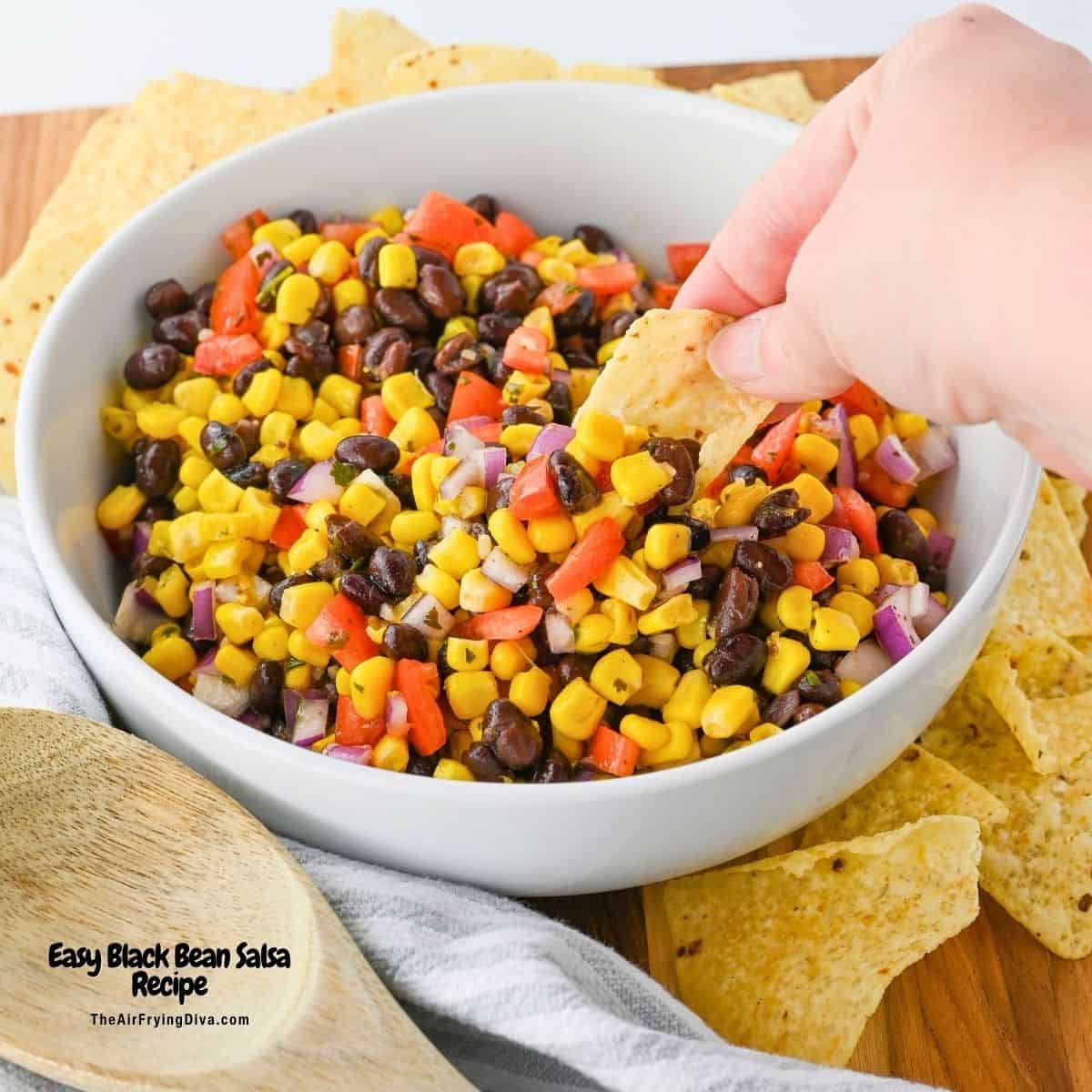 Easy Black Bean Salsa Recipe, a simple side dish recipe or appetizer dip made with corn and tomatoes in about 10 minutes.