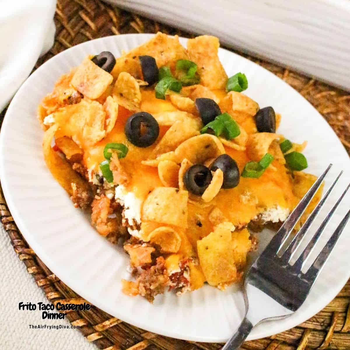 Frito Taco Casserole Dinner, an easy recipe for a layered meal featuring taco meat and corn chips with delicious toppings.