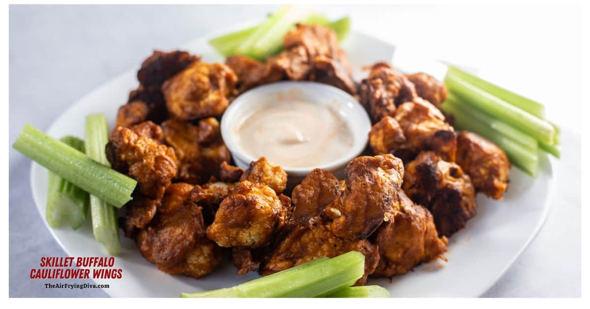 Skillet Buffalo Cauliflower Wings, lightly breaded cauliflower perfectly cooked crisp in a cast iron skillet and coated in buffalo sauce.