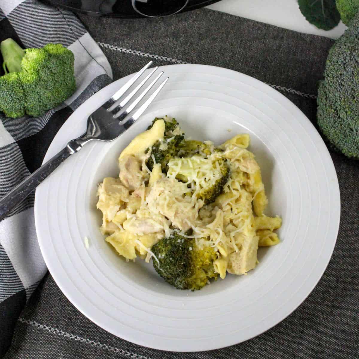 Slow Cooker Chicken and Broccoli Pasta, a simple and delicious crockpot recipe featuring a creamy and cheesy sauce.