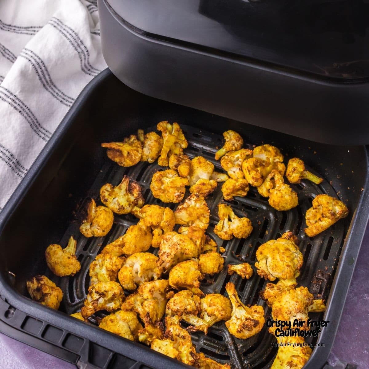 Crispy Air Fryer Cauliflower, a quick and simple healthy appetizer or side made with seasoned cauliflower air fried to perfection. Vegan.