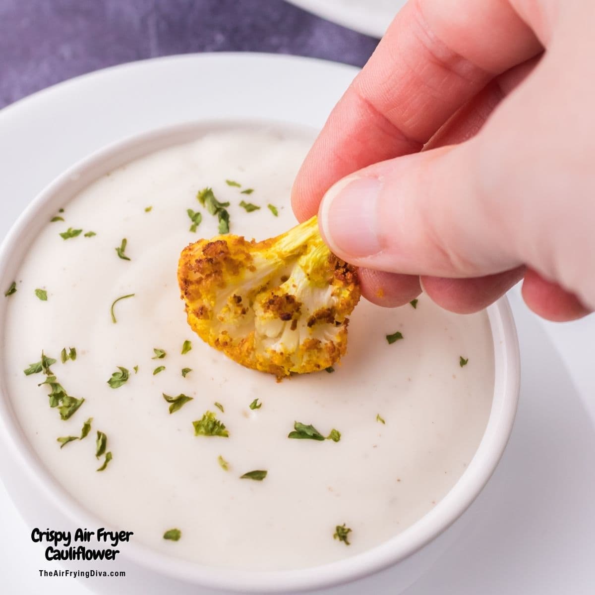 Crispy Air Fryer Cauliflower, a quick and simple healthy appetizer or side made with seasoned cauliflower air fried to perfection. Vegan.