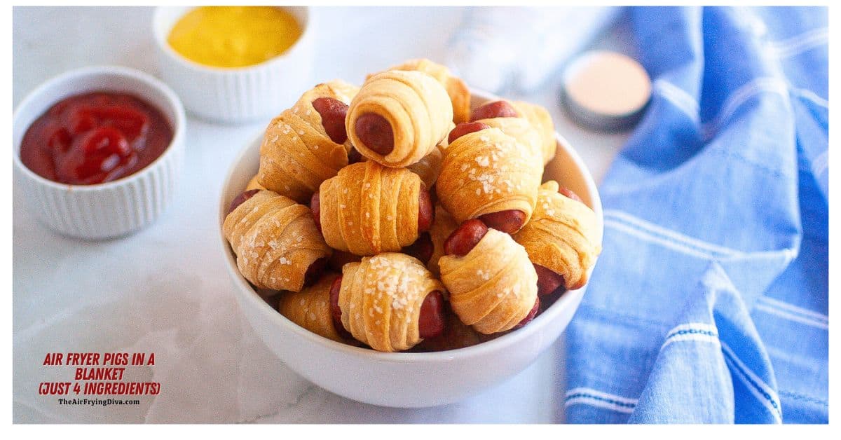 Air Fryer Pigs in a Blanket, a simple three ingredient appetizer or snack recipe featuring smoked sausages wrapped in crescent roll dough.