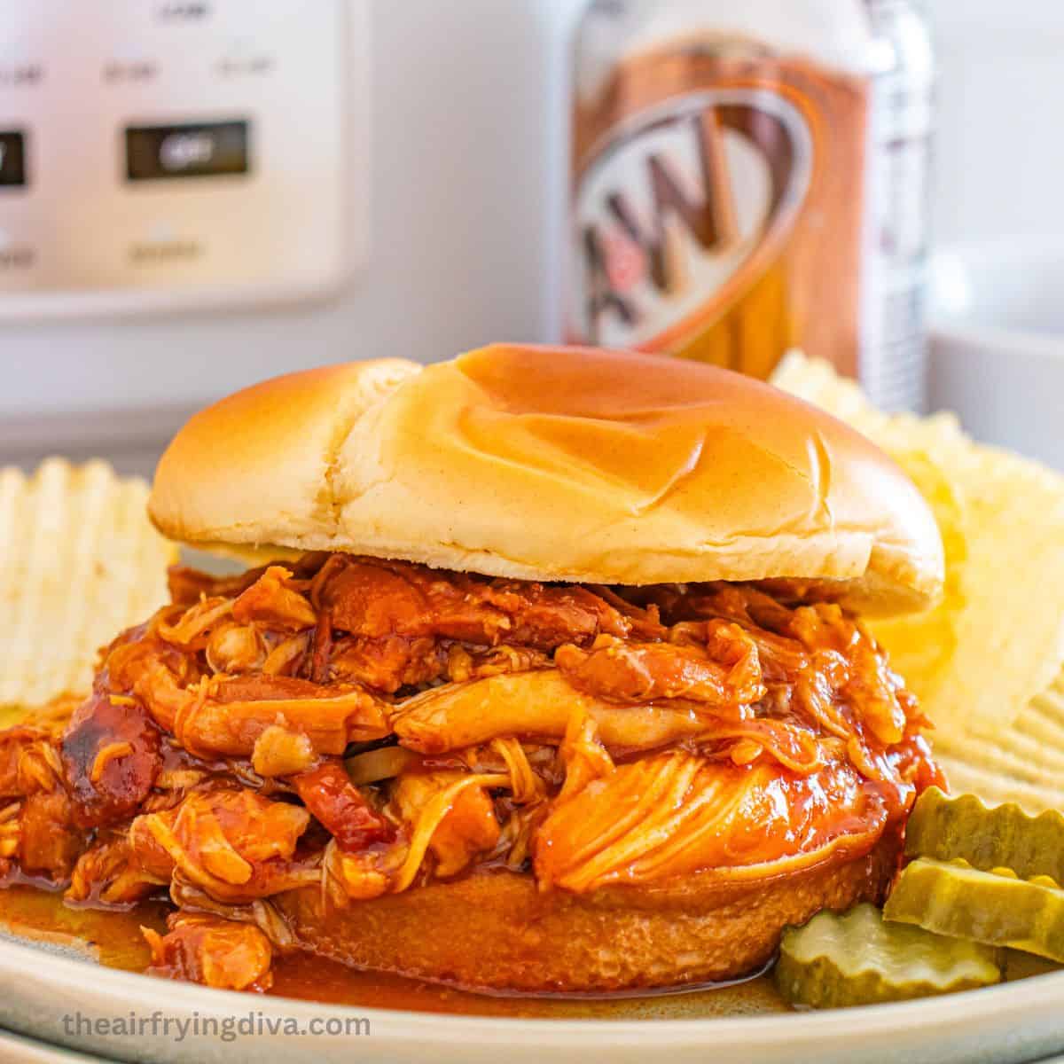 Slow Cooker Root Beer Pulled Chicken, a simple five ingredient recipe for tender and flavorful shredded chicken slow cooked to perfection.