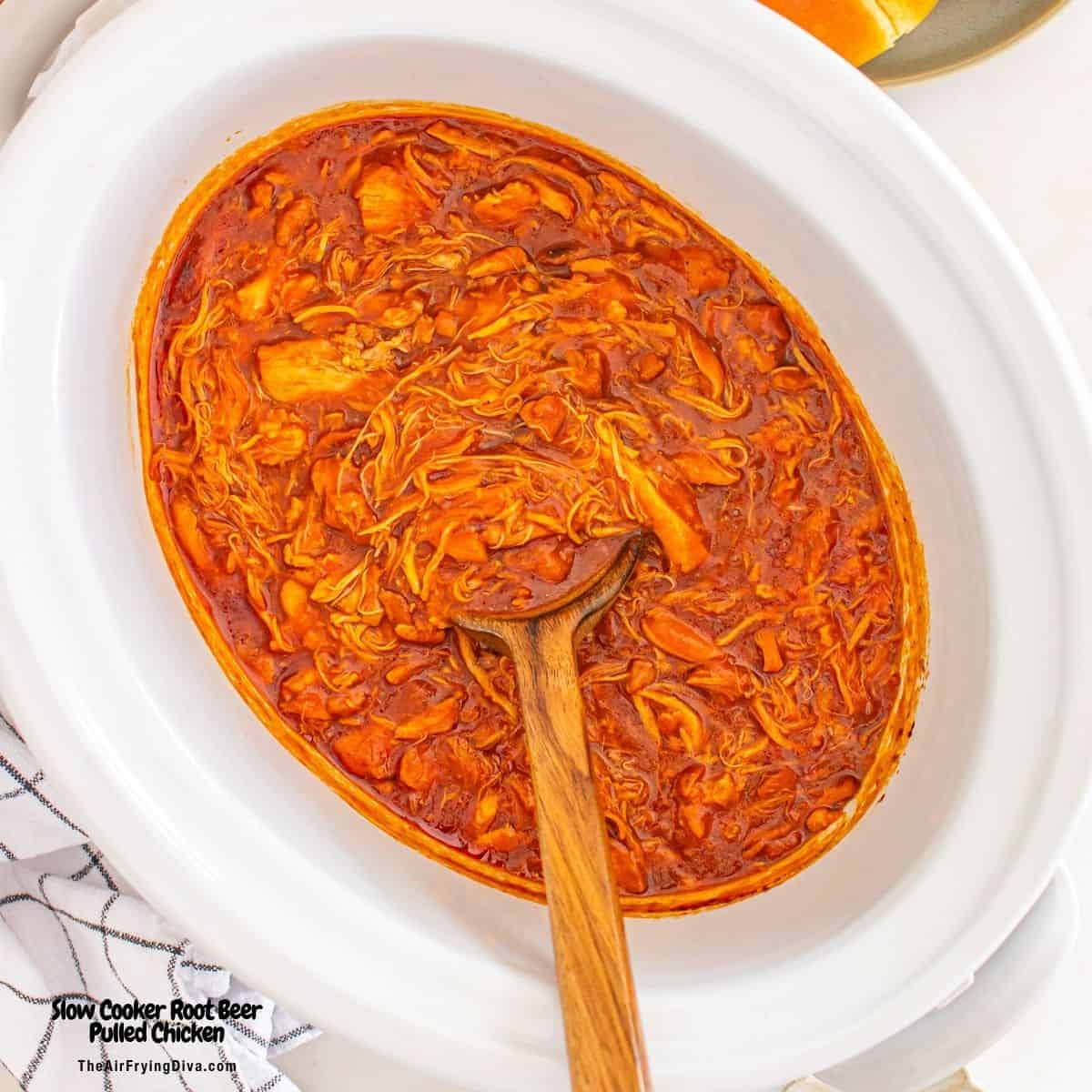 Slow Cooker Root Beer Pulled Chicken, a simple five ingredient recipe for tender and flavorful shredded chicken slow cooked to perfection.