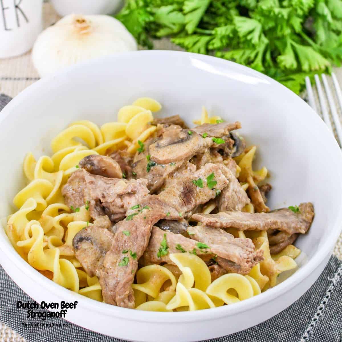 Dutch Oven Beef Stroganoff, a simple one pot meal recipe featuring tender beef slowly cooked in a rich and creamy sauce.