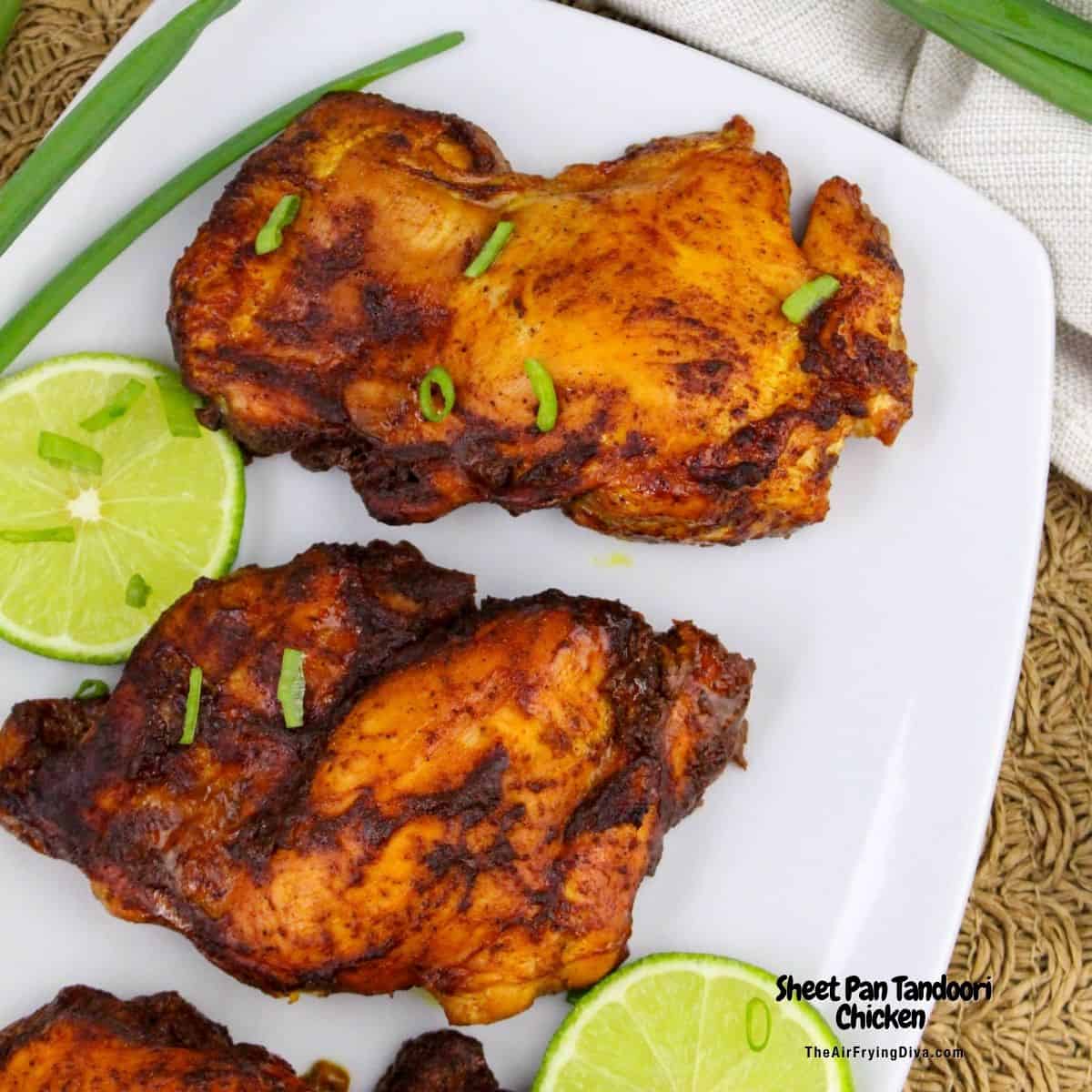 Sheet Pan Tandoori Chicken, a simple dinner recipe featuring chicken legs marinated in yogurt and spices and baked until tender and juicy.