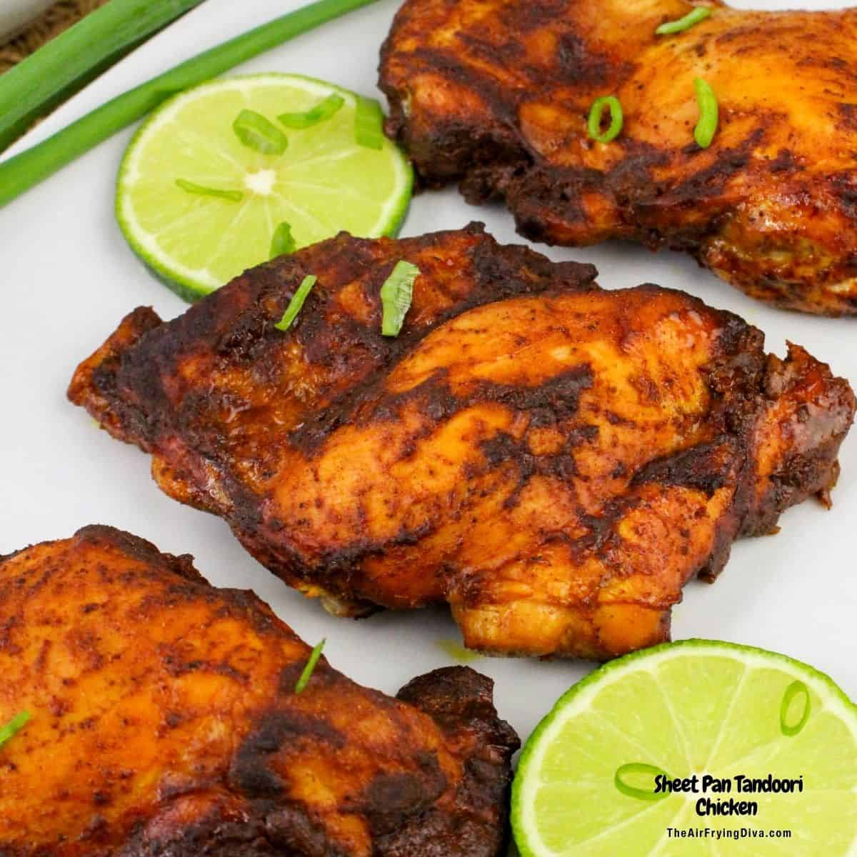 Sheet Pan Tandoori Chicken, a simple dinner recipe featuring chicken legs marinated in yogurt and spices and baked until tender and juicy.