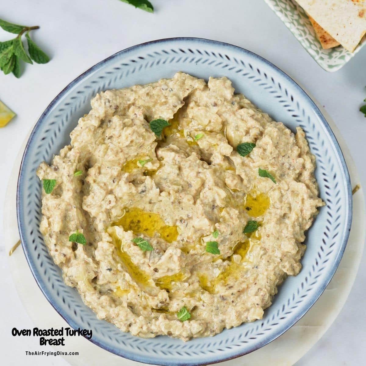 Air Fryer Eggplant Dip (Baba Ganoush), a delicious, creamy, savory, and easy recipe made from eggplant air fried until tender. Air Fryer Eggplant Dip (Baba Ganoush), a delicious, creamy, savory, and easy recipe made from eggplant air fried until tender.