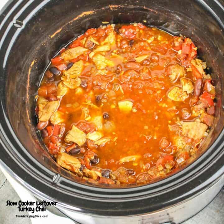 Slow Cooker Leftover Turkey Chili, a deliciously good crock pot style recipe made with cooked turkey, beans, and seasonings. 