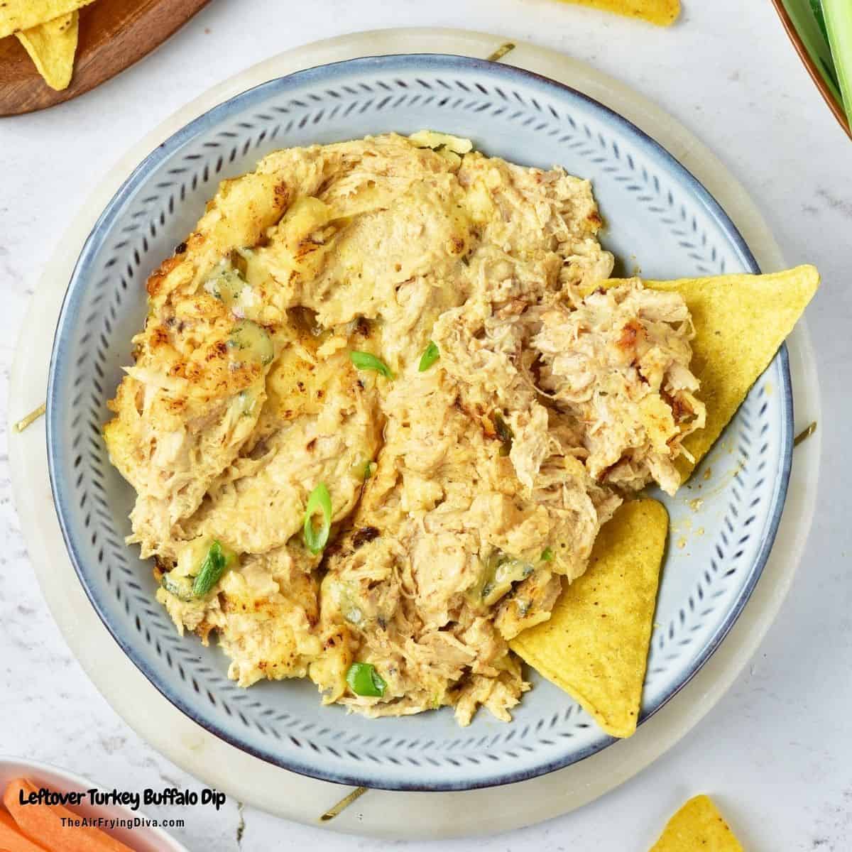 Leftover Turkey Buffalo Dip, a quick and easy appetizer recipe made with shredded cooked turkey, creamy cheese, and a bit of heat. Leftover Turkey Buffalo Dip, a quick and easy appetizer recipe made with shredded cooked turkey, creamy cheese, and a bit of heat.