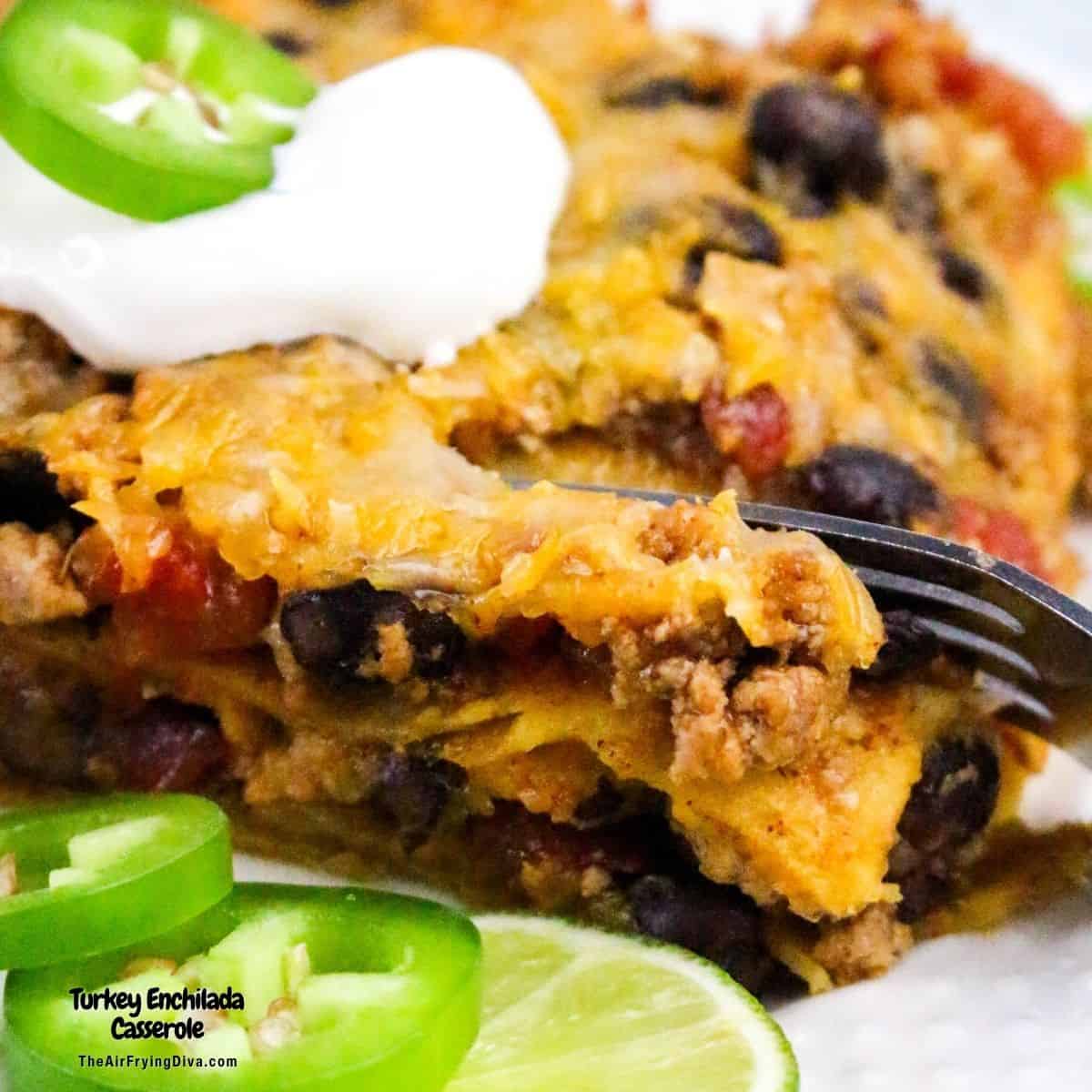 Turkey Enchilada Casserole, a simple and hearty dinner recipe made with ground turkey, beans and enchilada sauce.