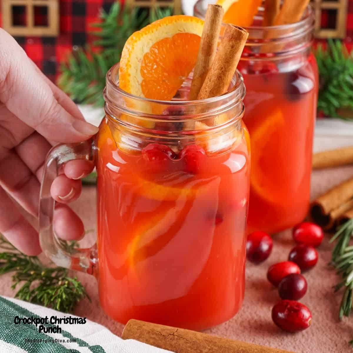 Crockpot Christmas Punch, an easy to prep delicious holiday beverage made with four ingredients and a boozy option. Crockpot Christmas Punch, an easy to prep delicious holiday beverage made with four ingredients and a boozy option.