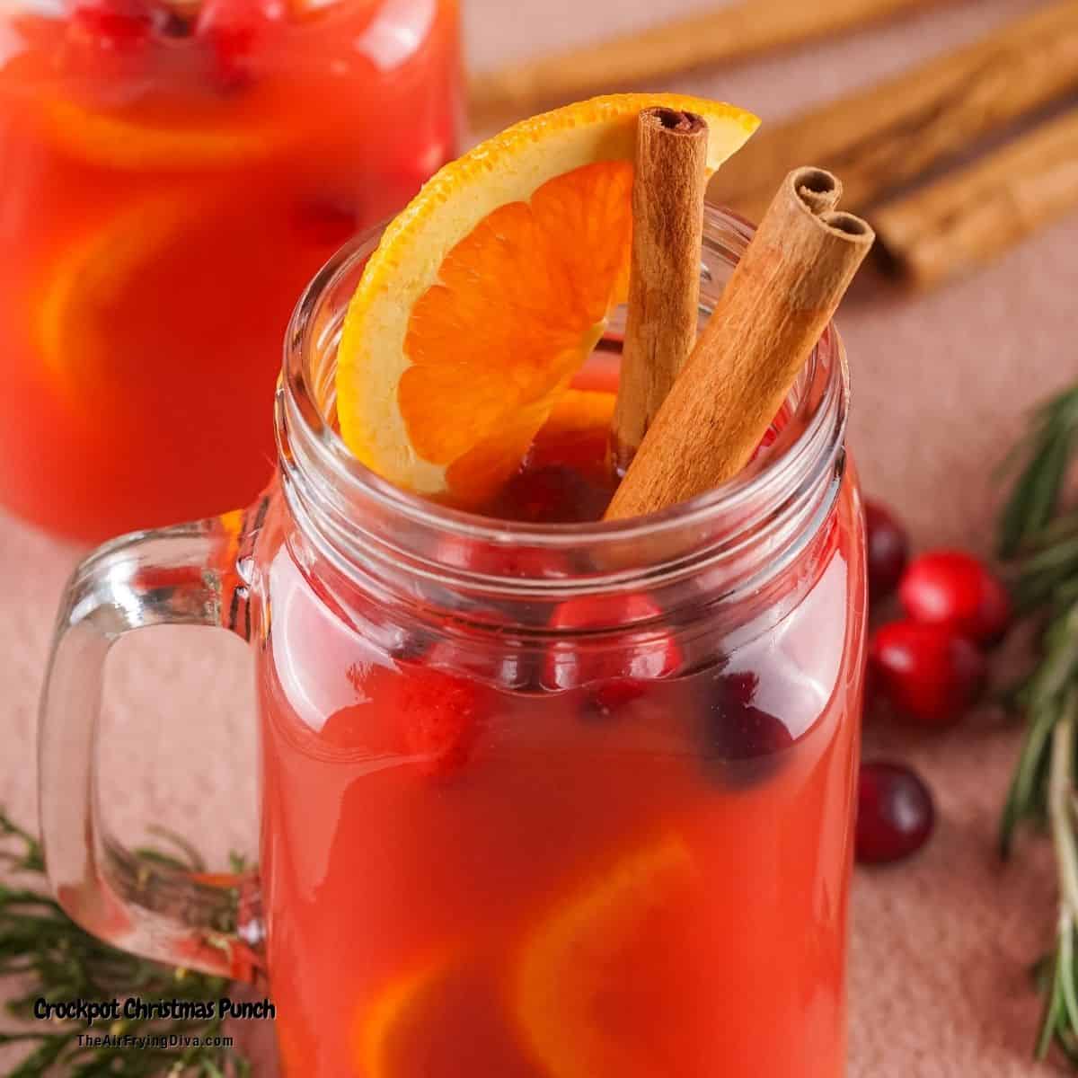Crockpot Christmas Punch, an easy to prep delicious holiday beverage made with four ingredients and a boozy option. Crockpot Christmas Punch, an easy to prep delicious holiday beverage made with four ingredients and a boozy option.