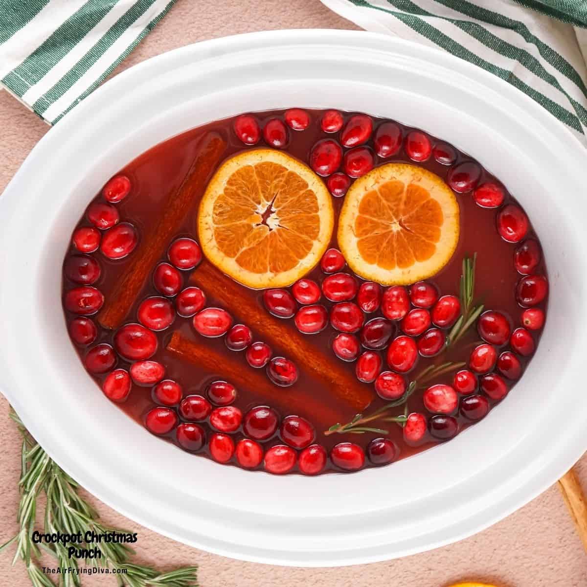 Crockpot Christmas Punch, an easy to prep delicious holiday beverage made with four ingredients and a boozy option. Crockpot Christmas Punch, an easy to prep delicious holiday beverage made with four ingredients and a boozy option.