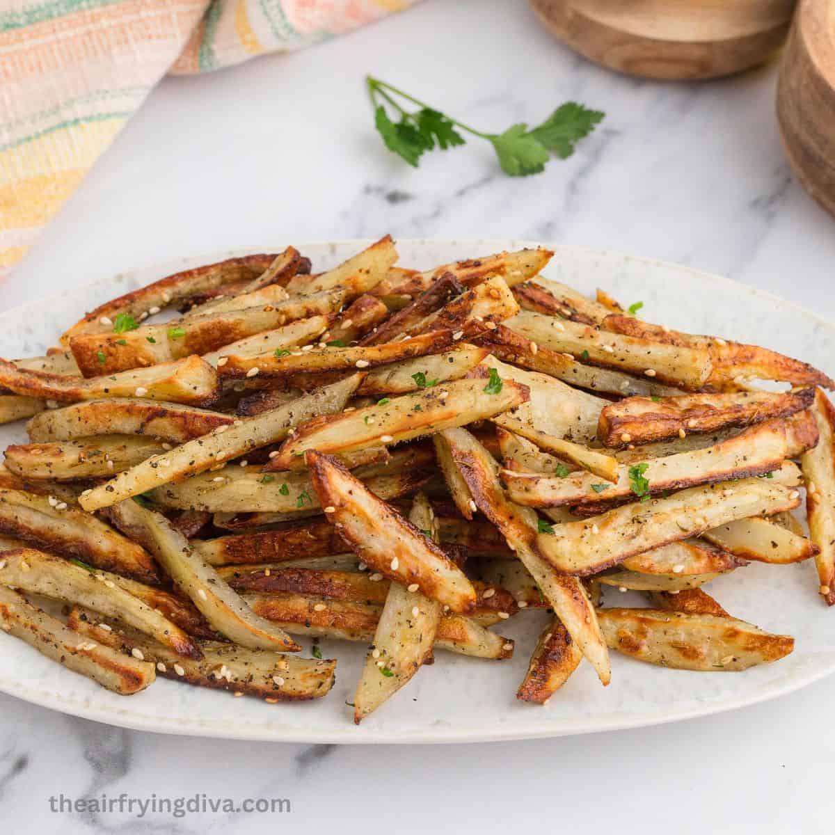 Sheet Pan Baked Za’atar Fries, crispy and flavorful homemade French Fries seasoned with savory Za'atar seasoning blend. Sheet Pan Baked Za’atar Fries, crispy and flavorful homemade French Fries seasoned with savory Za'atar seasoning blend.