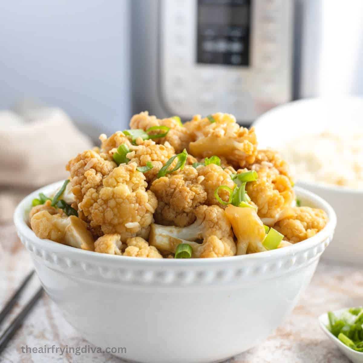 Instant Pot Kung Pao Cauliflower, savory, sweet, and somewhat spicy cauliflower florets pressure cooked to perfection in 20 minutes. Instant Pot Kung Pao Cauliflower, savory, sweet, and somewhat spicy cauliflower florets pressure cooked to perfection in 20 minutes.
