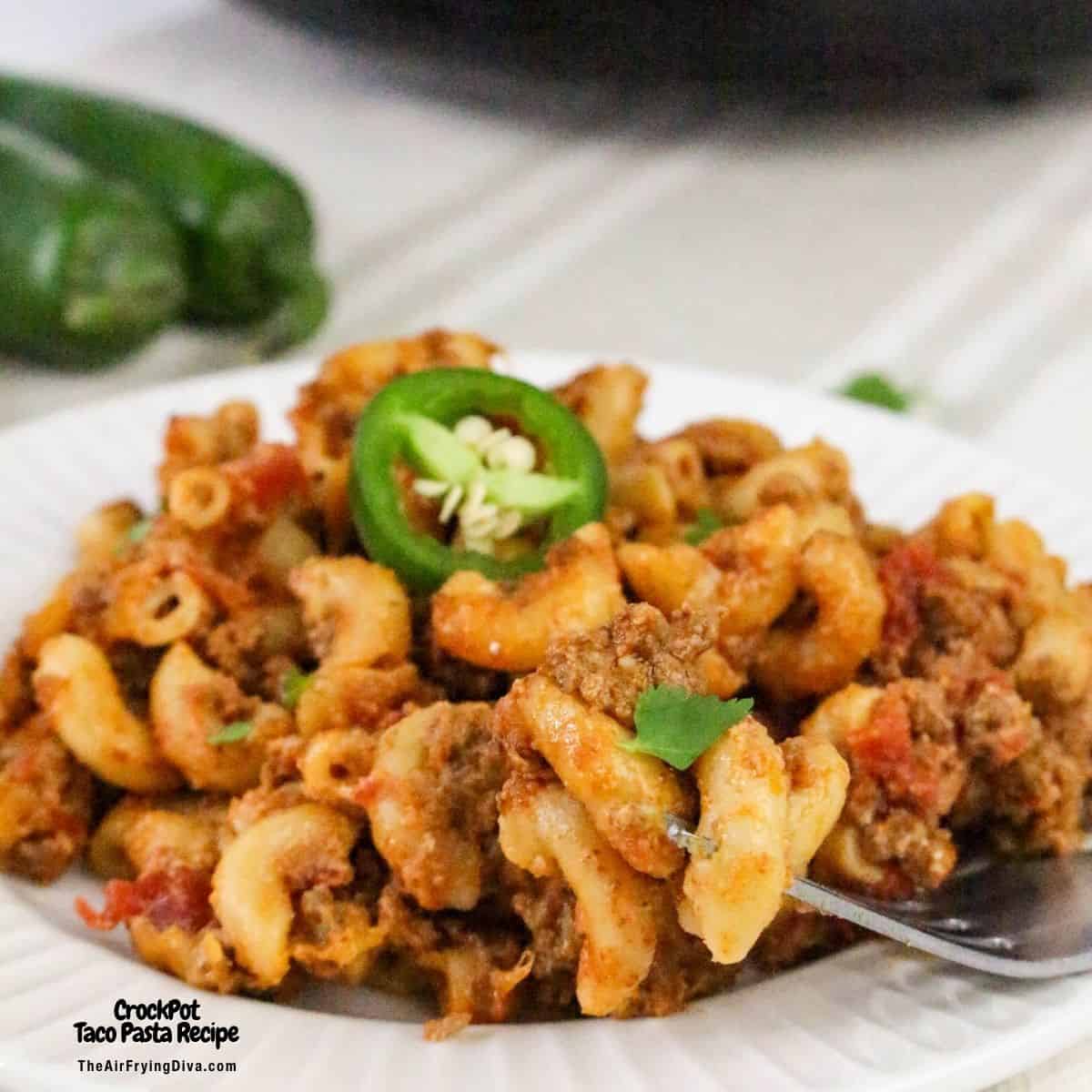 CrockPot Taco Pasta is the ultimate set-it-and-forget-it meal. Hearty ground beef, zesty taco seasoning, and creamy melted cheese with pasta. CrockPot Taco Pasta is the ultimate set-it-and-forget-it meal. Hearty ground beef, zesty taco seasoning, and creamy melted cheese with pasta.