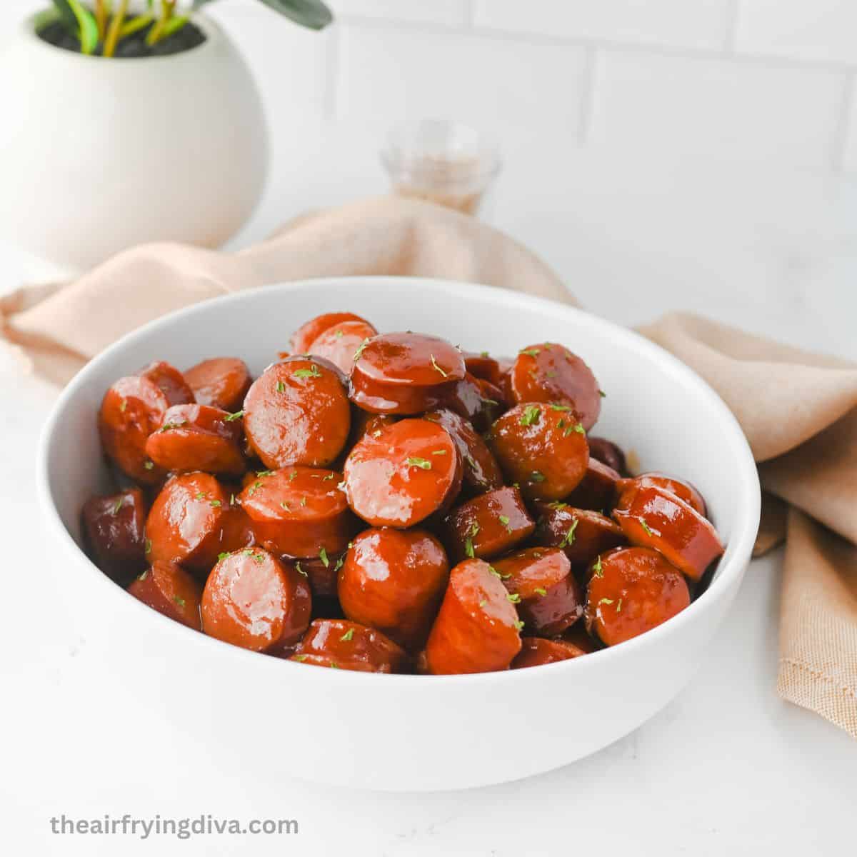 Slow Cooker BBQ Kielbasa Bites, a foolproof 4 ingredients recipe for sweet and savory smoked Polish sausage made in a crockpot. Slow Cooker BBQ Kielbasa Bites, a foolproof 4 ingredients recipe for sweet and savory smoked Polish sausage made in a crockpot.