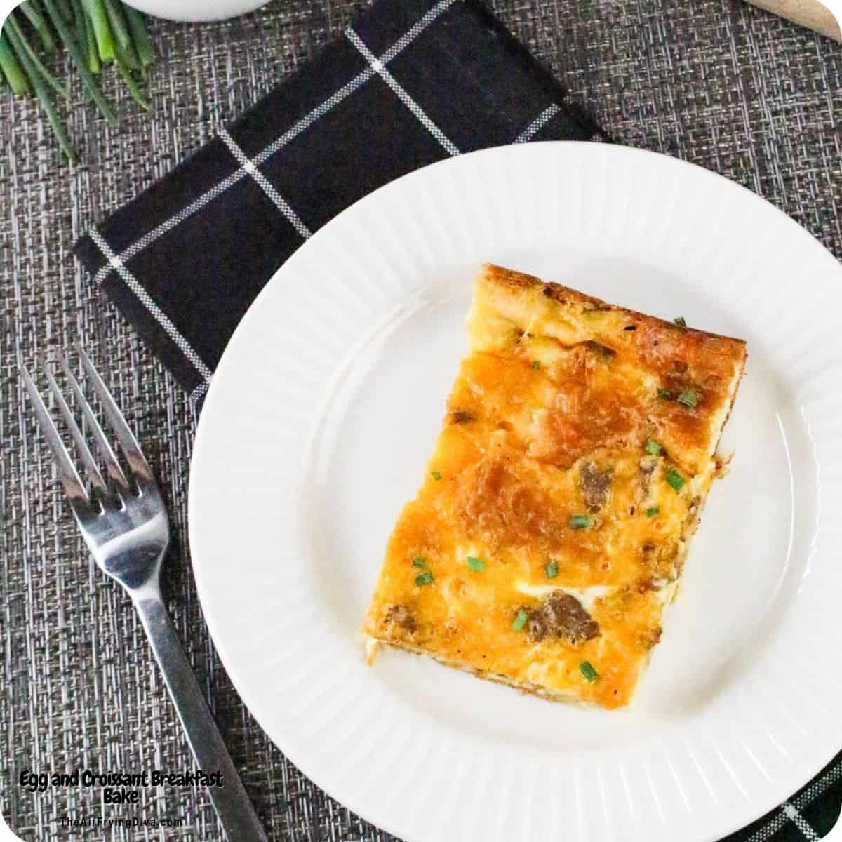Egg and Croissant Breakfast Bake an easy recipe features savory sausage, sharp cheddar, and buttery croissants. The ultimate easy morning meal Egg and Croissant Breakfast Bake
