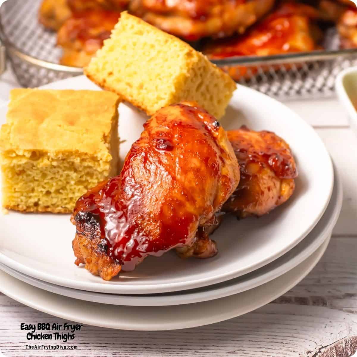 Easy BBQ Air Fryer Chicken Thighs recipe featuring savory and incredibly juicy chicken with a sticky barbecue glaze air fried to perfection. Easy BBQ Air Fryer Chicken Thighs recipe featuring savory and incredibly juicy chicken with a sticky barbecue glaze air fried to perfection.
