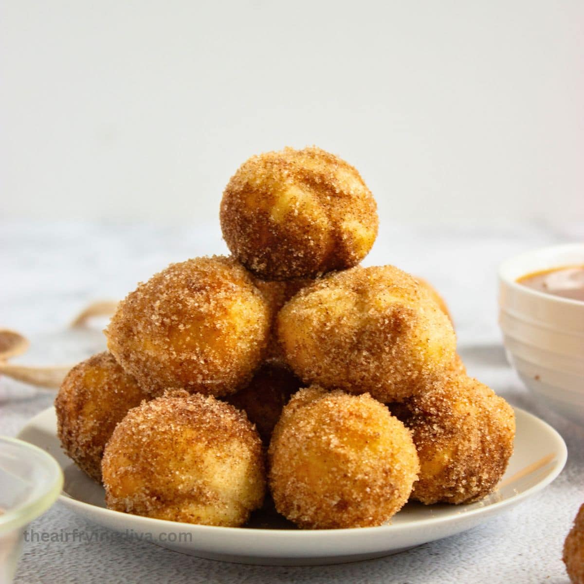 Easy Air Fryer Churro Donut Holes, an easy 4 Ingredient recipe made with refrigerated biscuit dough in under 15 minutes. Easy Air Fryer Churro Donut Holes, an easy 4 Ingredient recipe made with refrigerated biscuit dough in under 15 minutes.