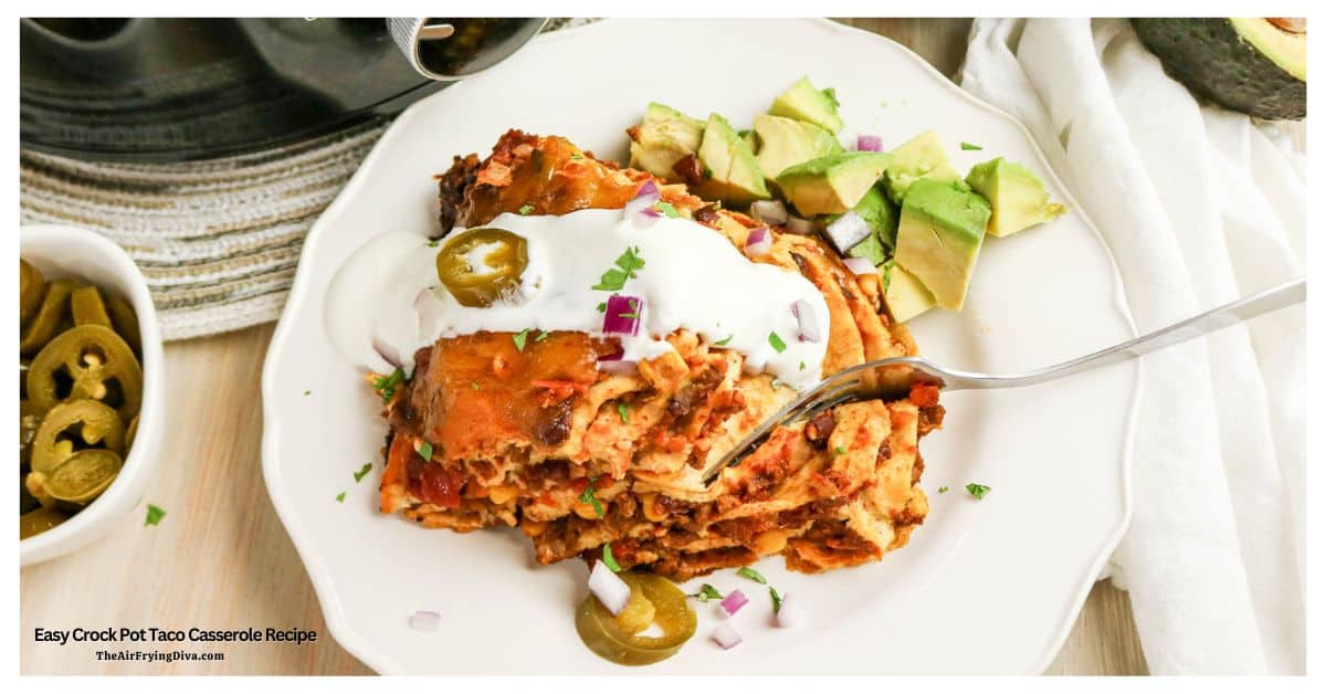 Easy Crock Pot Taco Casserole, a recipe for Cheesy Taco Lasagna with Tortillas, seasoned beef, beans, corn, and melty cheese. Easy Crock Pot Taco Casserole